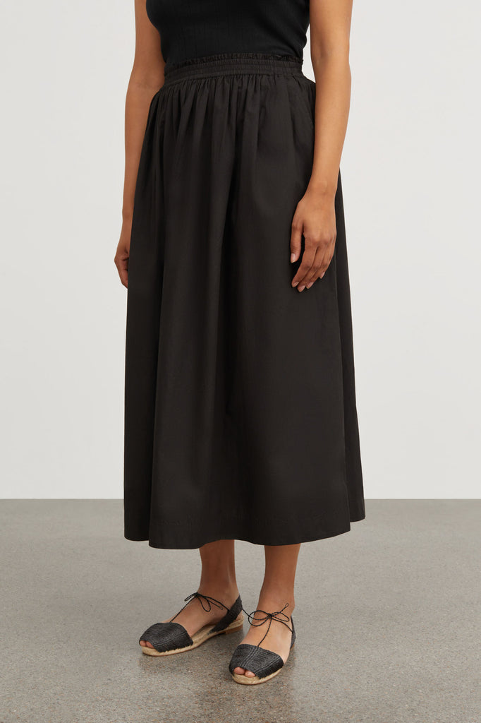 black cotton pull on Dagny skirt with elastic waist by Skall Studio