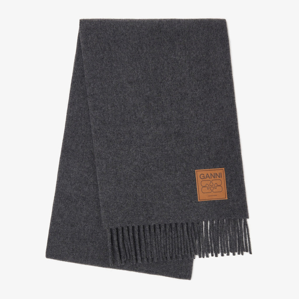 GANNI wool scarf with fringing and a tan leather brand logo patch dark charcoal grey