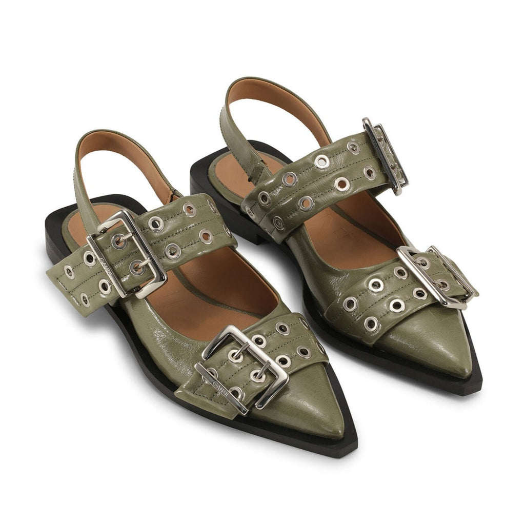 chunky kalamata green slip on ballet flats with silver buckles and a sling back by Ganni