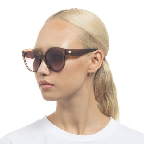 capacious sunglasses in translucent clear chocolate brown by Le Specs