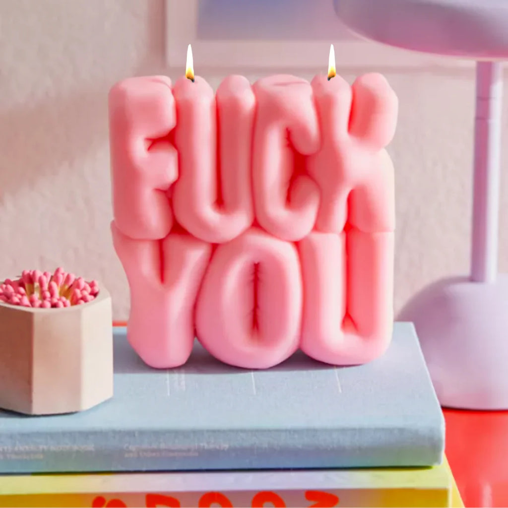 pink fuck you puffer candle by wavey casa