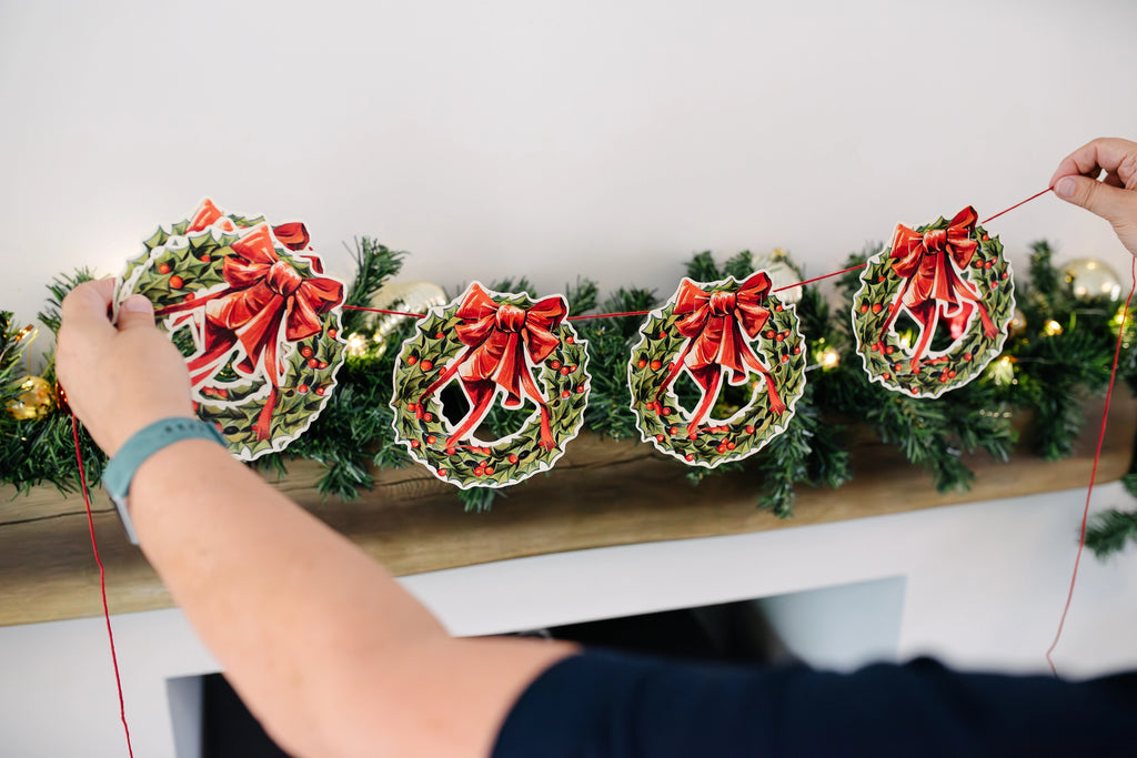 mamelok vintage-style paper die cut christmas garland holly wreath red ribbon