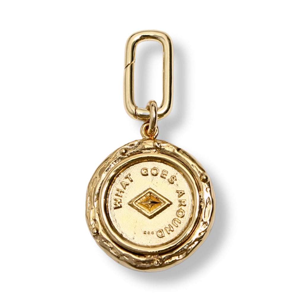 The Karma coin charm by British brand By Alona gold
