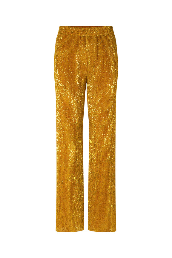 gold sequin trousers by stine goya