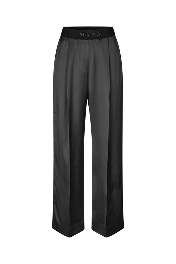 shiny jet black slouchy pull on Ciara trousers with elastic waist by stine goya