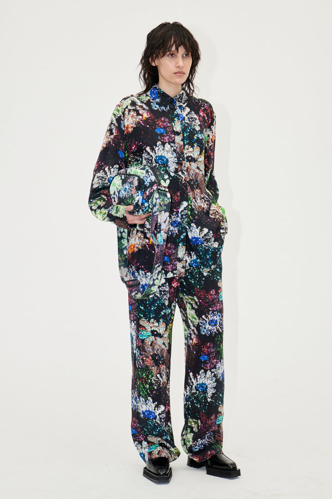 slouchy pull on fatou trousers with firework glitter bloom design by stine goya