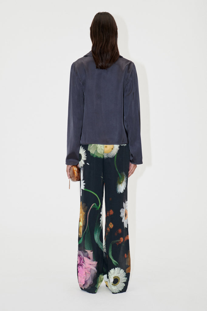 black pull on Fatou trousers with scanned flowers by Stine Goya