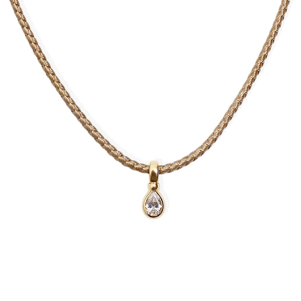 By Alona Auralis necklace from TAUPE braided cord 18K gold teardrop pendant with a sparkling cubic zirconia stone