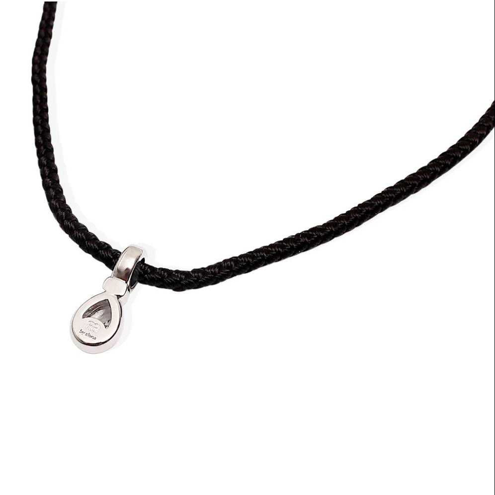 By Alona Auralis necklace from black braided cord Sterling silver teardrop pendant with a sparkling cubic zirconia stone