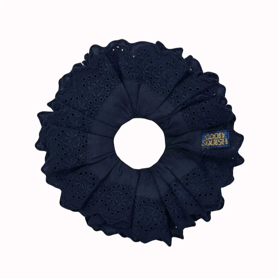 navy blue cotton scrunchie with baby blumberg broderie anglais trim by good squish