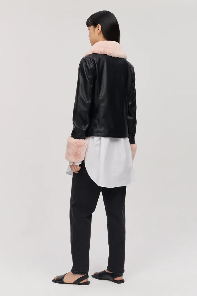 black vegan faux leather Brittany jacket by Jakke with pink contrast collar and cuffs