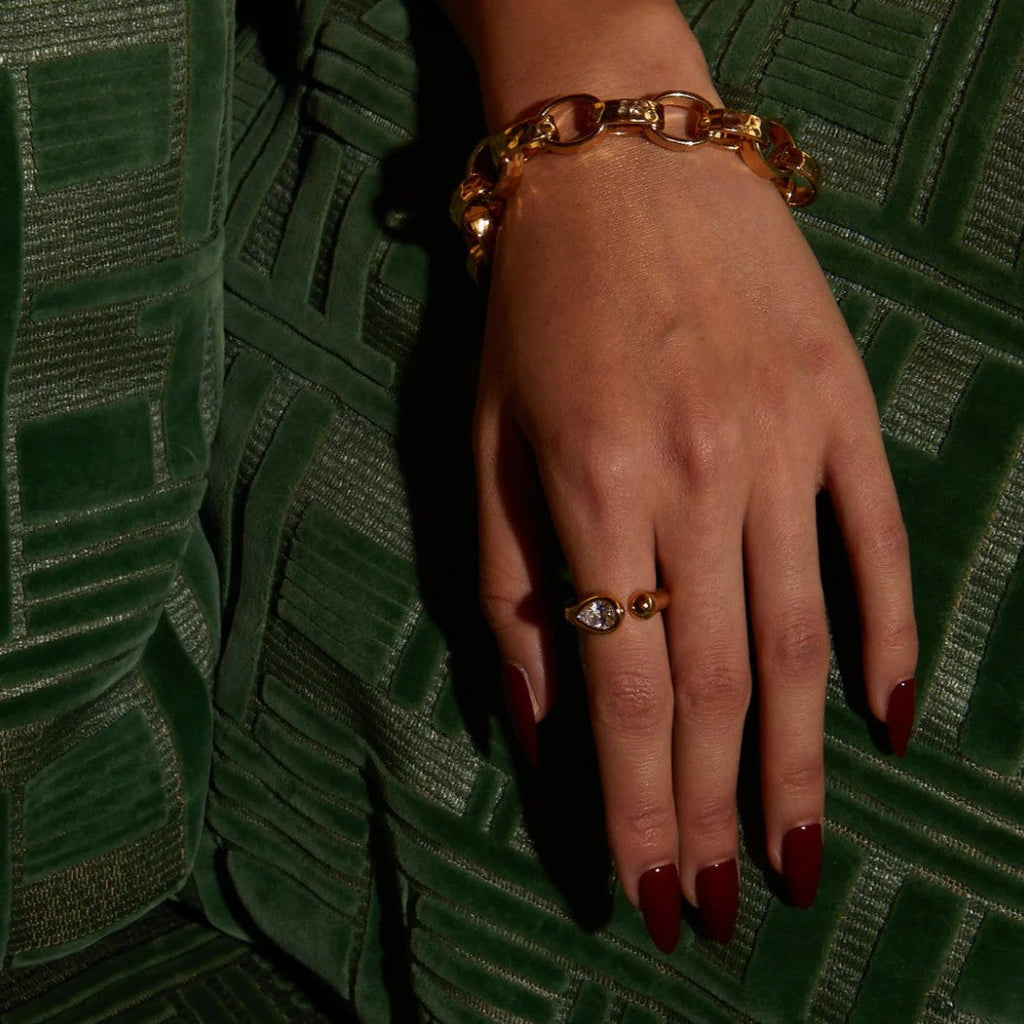 By Alona Celestine open ring  set with a sparkling teardrop cubic zirconia stone in gold