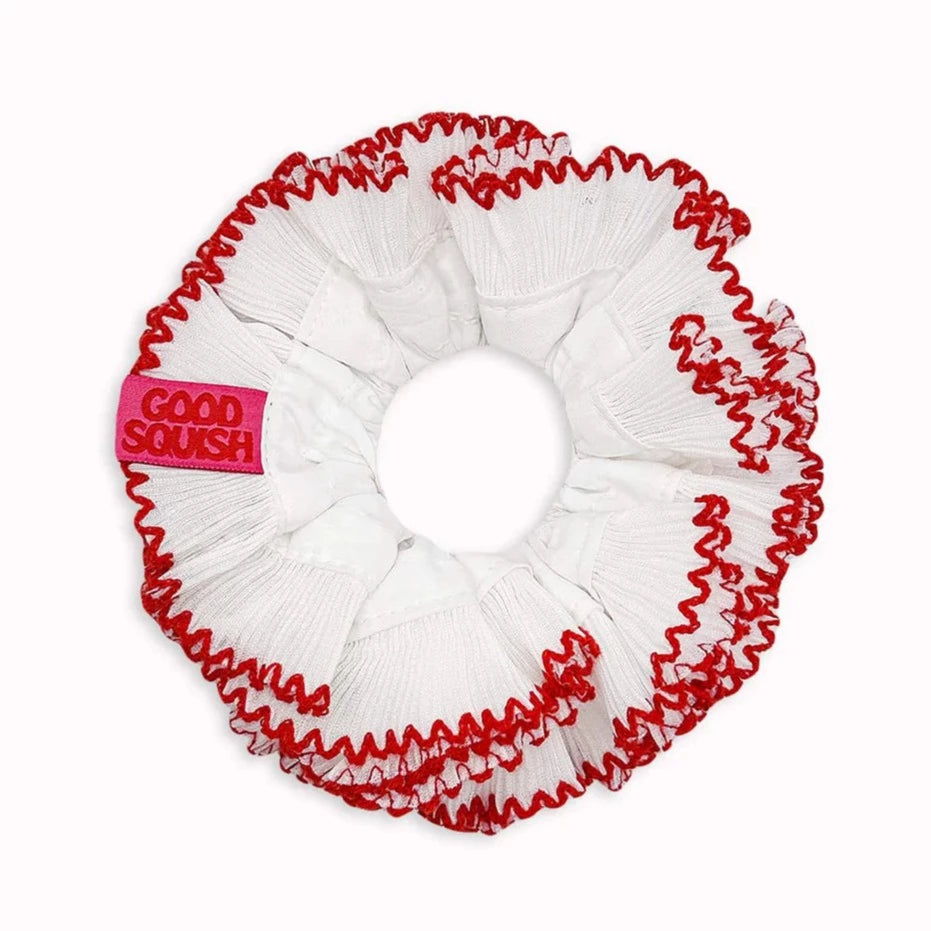 white lotus curious scrunchie with red trim by good squish