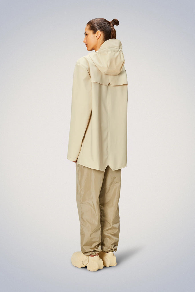 beige dune short rain coat with hood by Rains