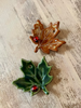 RUST BROWN glazed ceramic leaf Christmas decoration with a tiny ladybug detail by Chloe Charlett handmade in glasgow scotland
