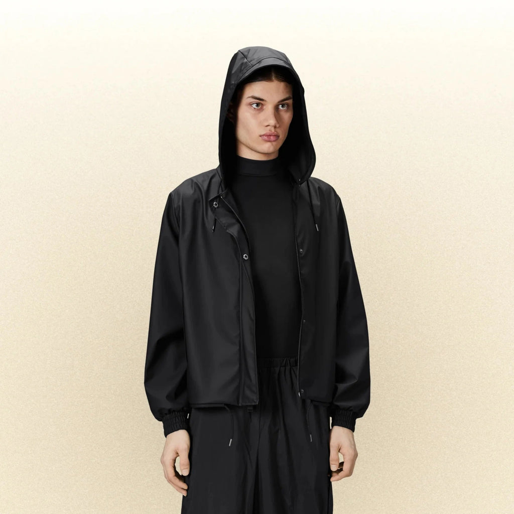 matt black cropped string waterproof jacket with hood by Rains