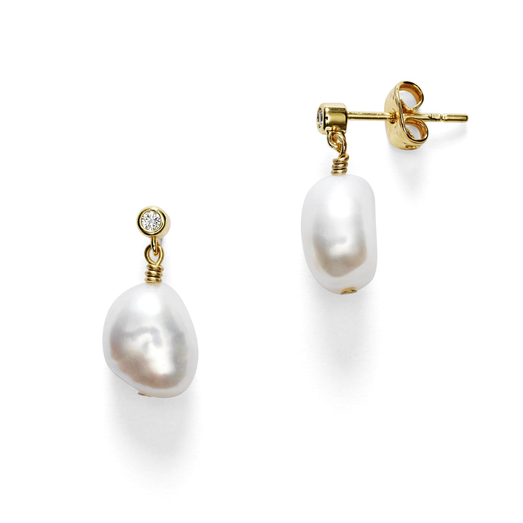 Pair of small baroque pearl drop earrings by Anni Lu with cubic zirconia detail