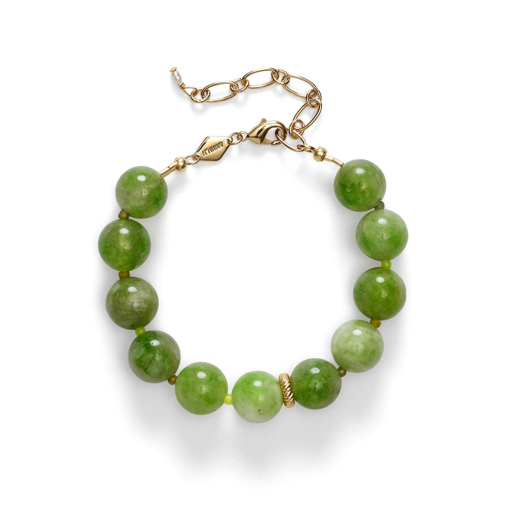 A bracelet by Anni Lu with large round green beads
