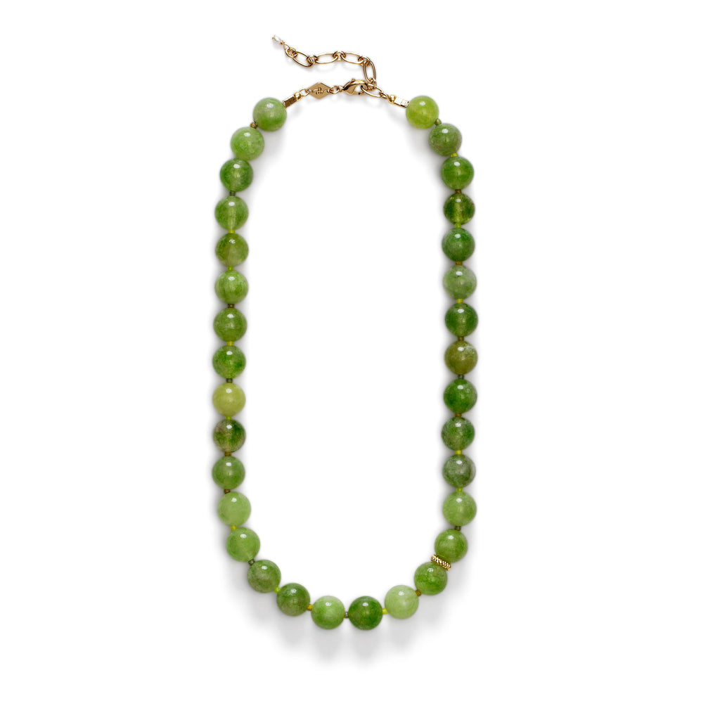 A necklace by Anni Lu with large round green beads