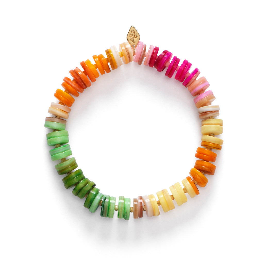An elastic bracelet by Anni Lu with brightly multi-coloured disc beads